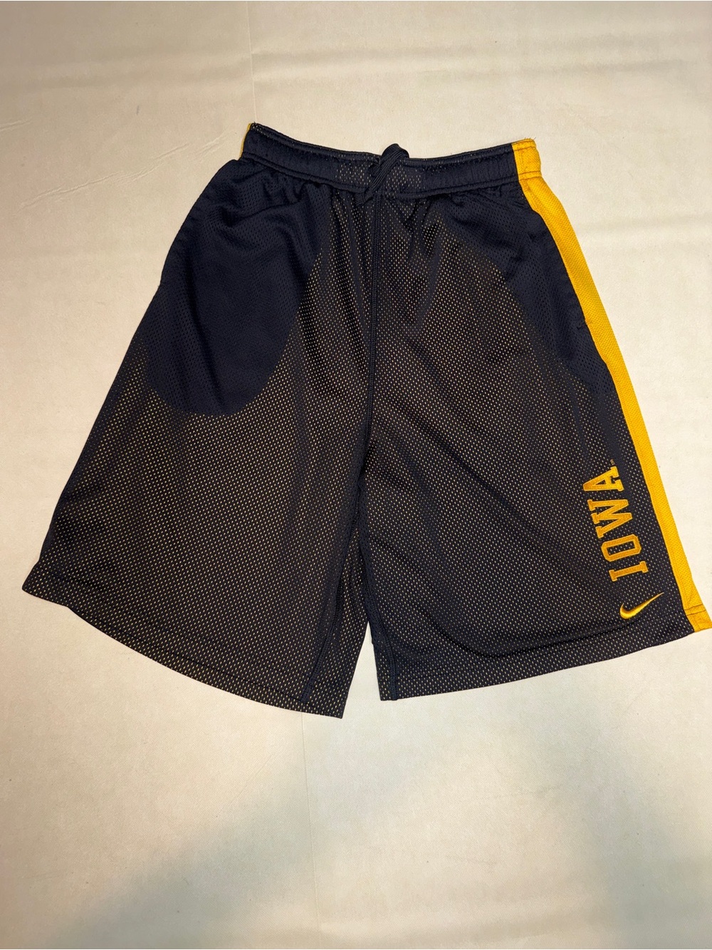 Nike Men’s Black Athletic Mesh Shorts with Gold Side Stripe and IOWA Logo